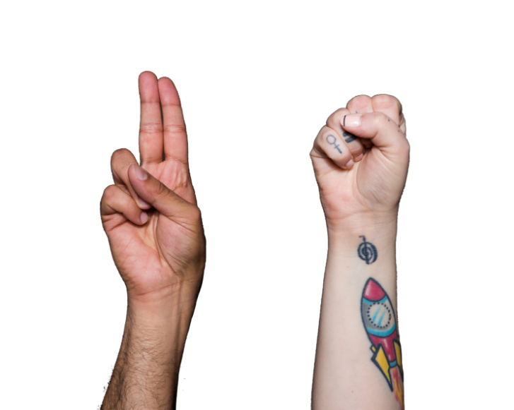 ID: against a white background are two hands. One is holding up two fingers and the other is in a fist with a rocket ship tattoo.