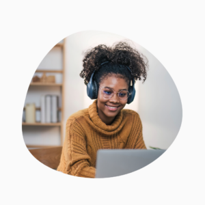 Image of a person smiling on a computer 